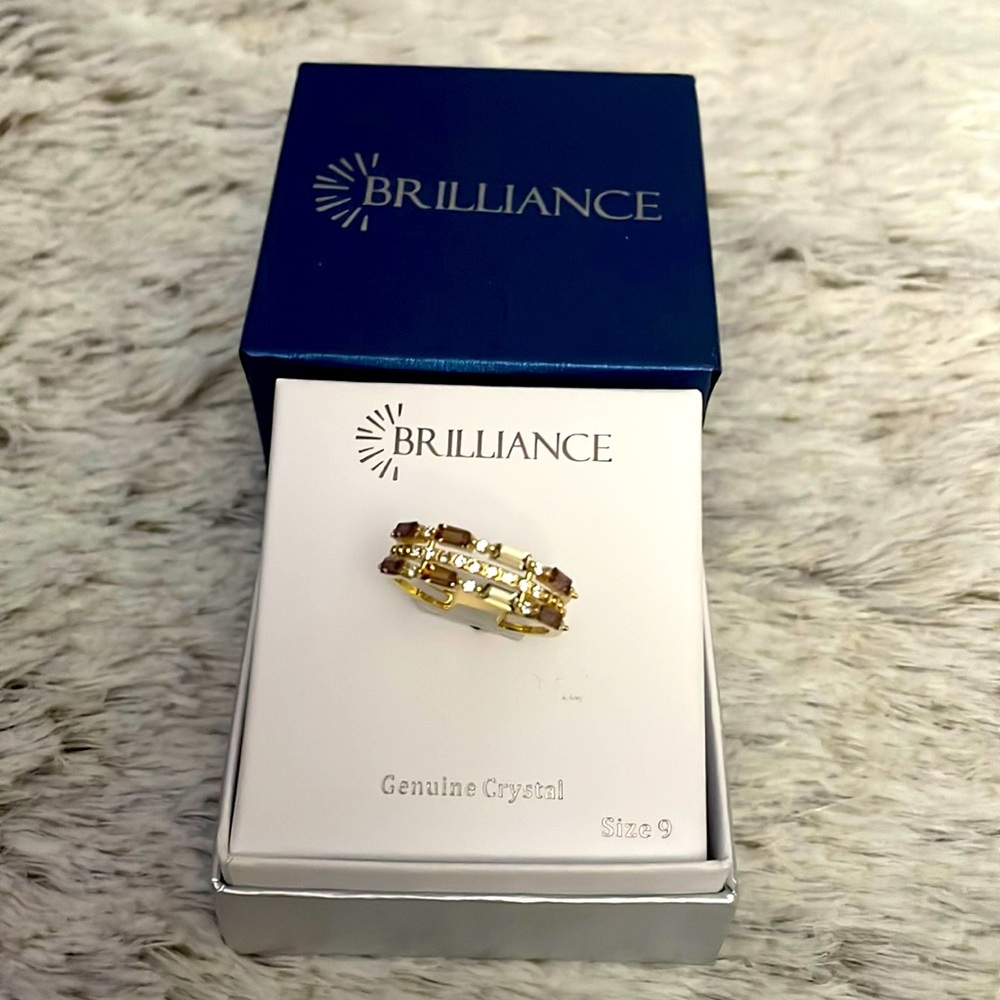 “Brilliance “genuine crystal ring.Size-9.Brand new.Color gold,brown,tan.